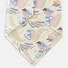 View 4 of product A rolled-up Cream Multi Bloomsbury-Inspired Pattern Silk Tie by Turnbull & Asser, featuring a pastel floral and paisley design in green, blue, pink, and orange tones, displayed on a white background.