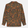 View 5 of product The Turnbull & Asser Khaki Green Floral Silk Holiday Fit Winnington Shirt features a bold floral print with orange, yellow, and purple on an olive background, plus a spread collar and chest pocket for versatile style.