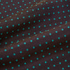 View 4 of product The Turnbull & Asser Blue and Dark Brown Micro Dot Silk Cravat features evenly spaced blue micro dots on dark brown silk, displayed neatly folded on a white background.