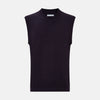 View 1 of product The Turnbull & Asser Dark Purple Fine Merino V-Neck Vest features ribbed edges and a sleeveless design, ideal for a gentleman’s style in cooler seasons, and is displayed on a plain white background.