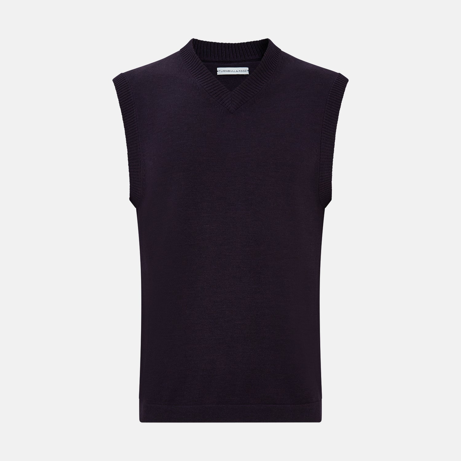 View 1 of product The Turnbull & Asser Dark Purple Fine Merino V-Neck Vest features ribbed edges and a sleeveless design, ideal for a gentleman’s style in cooler seasons, and is displayed on a plain white background.