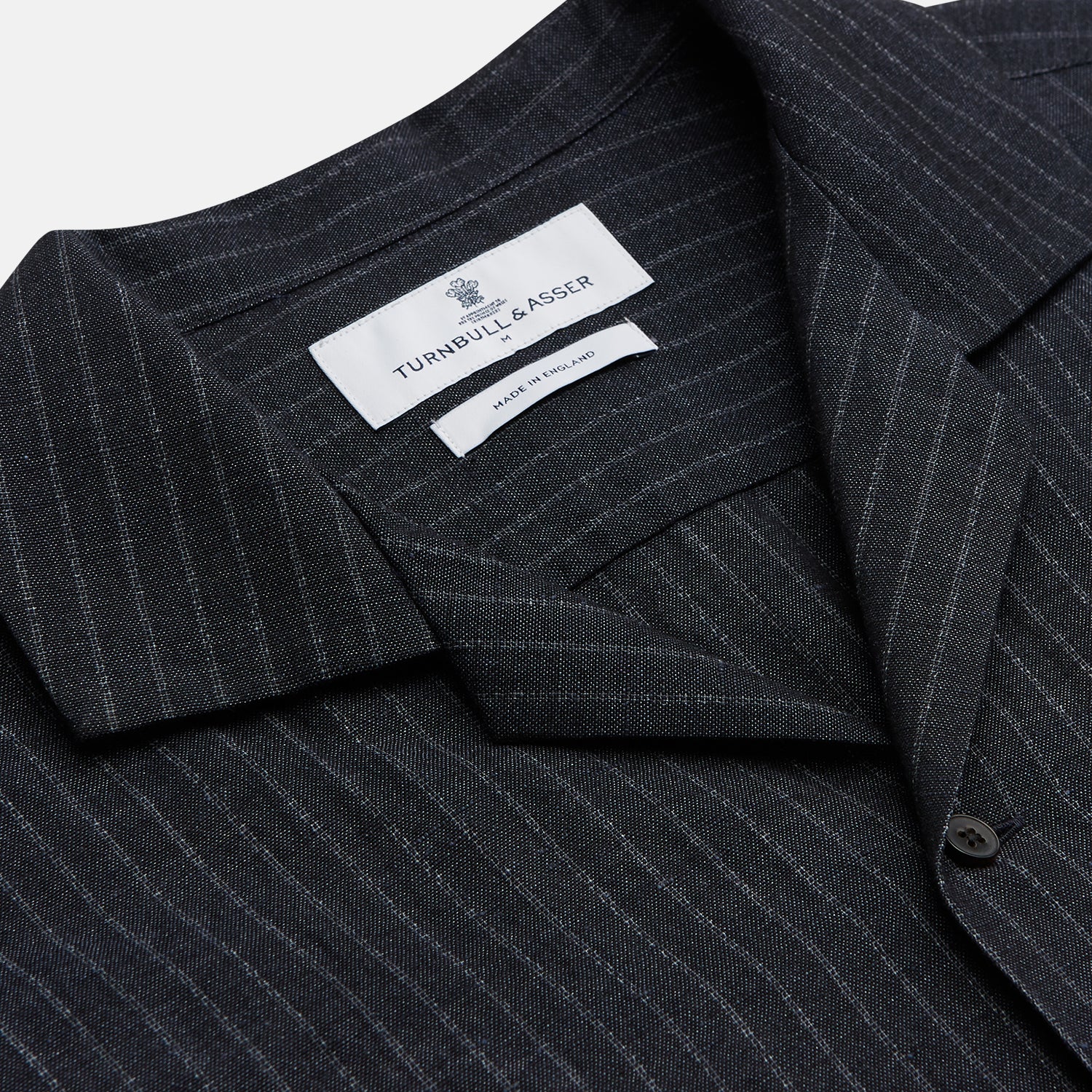 View 6 of product The Navy Tailored Pinstriped Shirt Jacket by Turnbull & Asser is a smart-casual, lightweight cotton-linen piece with long sleeves, a collar, left chest pocket, and front buttons for easy style.