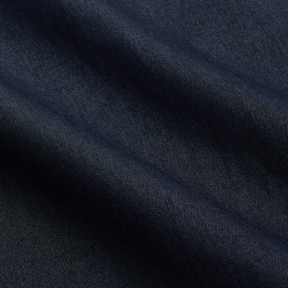 The Turnbull & Asser Blue Weekend Fit Finch Shirt features a Derby collar, chest pocket, classic white buttons, and timeless style, all in cotton. Laid flat on a white background.