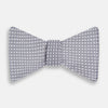 View 1 of product The Turnbull & Asser Silver and White Square Silk Bow Tie features a subtle geometric pattern, ideal for formalwear, and is displayed against a plain white background.