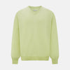 View 1 of product The Turnbull & Asser Pistachio Cashmere V-neck Jumper features long sleeves, ribbed cuffs and hem. Shown in light green against a white background, it's a classic addition to any knitwear collection.