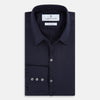 View 5 of product The Navy Twill Windsor Shirt by Turnbull & Asser features long sleeves, a button-up front, British craftsmanship, and a refined Windsor collar, shown in dark navy on a plain white background.