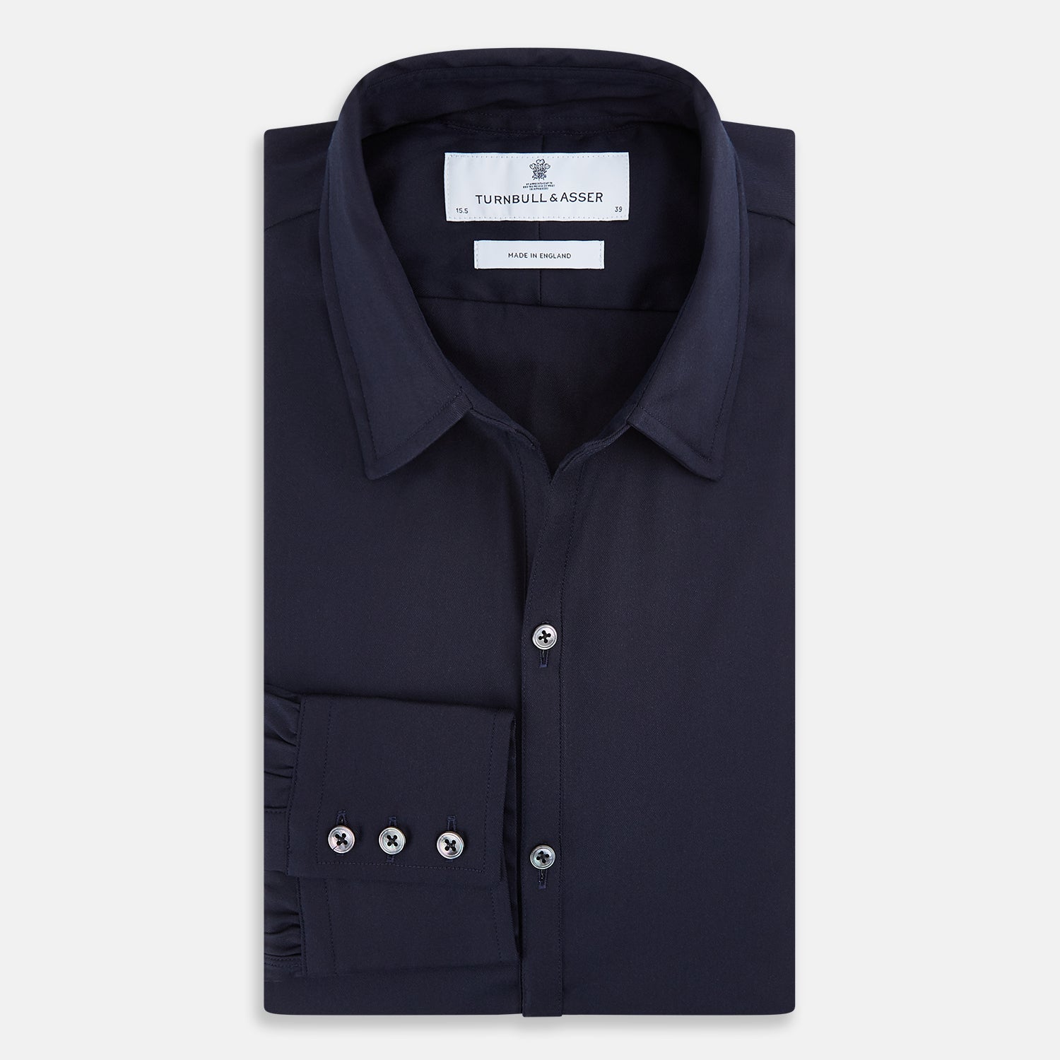 View 5 of product The Navy Twill Windsor Shirt by Turnbull & Asser features long sleeves, a button-up front, British craftsmanship, and a refined Windsor collar, shown in dark navy on a plain white background.