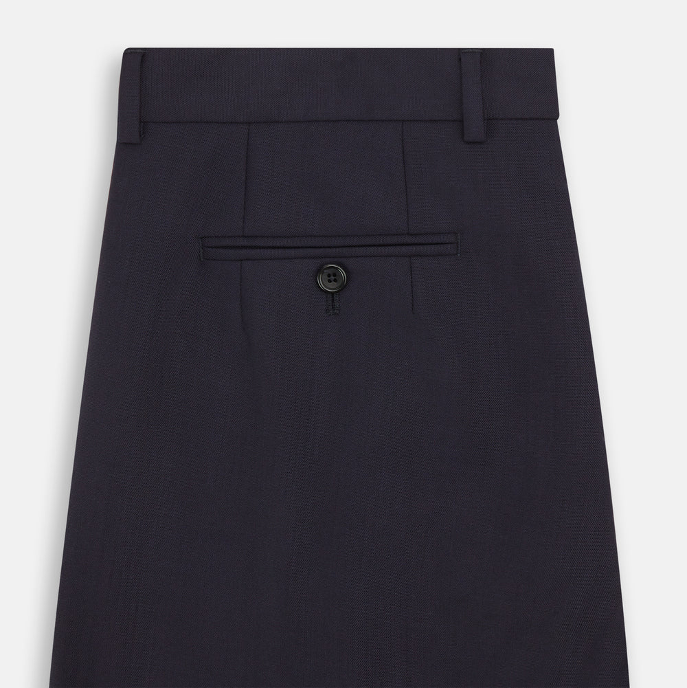 The Navy Rupert Trousers by Turnbull & Asser are tailored wool trousers with a button and zip closure, belt loops, and front creases, elegantly displayed against a plain white background.