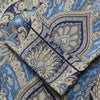 View 4 of product The Turnbull & Asser Pale Blue Baroque Silk-blend Hyde Pyjama Set features a long-sleeve button-up shirt and pants in a blue and beige paisley pattern, shown flat on a white background.