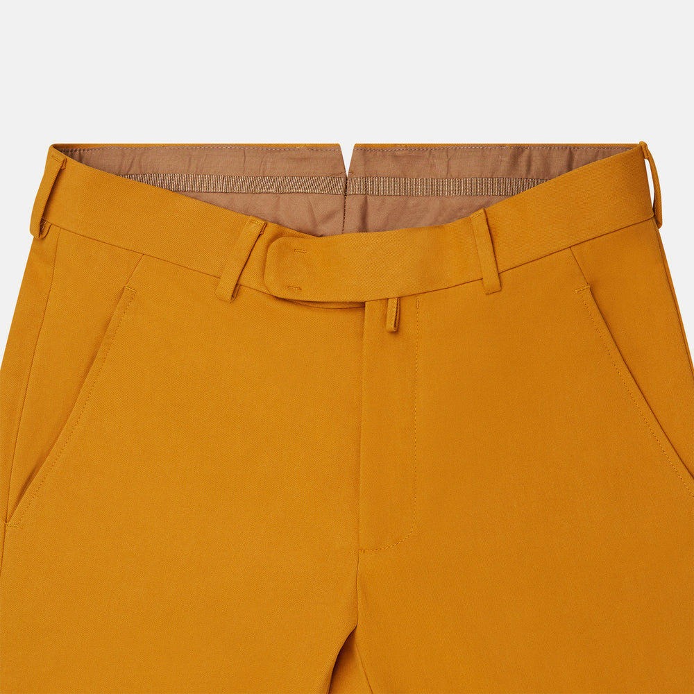 Turnbull & Asser Yellow James Trouser, made from Italian cotton with a matching belt, front crease, and straight fit cut, shown against a white background.