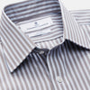 View 2 of product The Turnbull & Asser Pale Blue Multi Stripe Cotton Regular Fit Mayfair Shirt features long sleeves, a pointed collar, buttoned cuffs, and vertical stripes in pale blue tones, displayed against a white background.