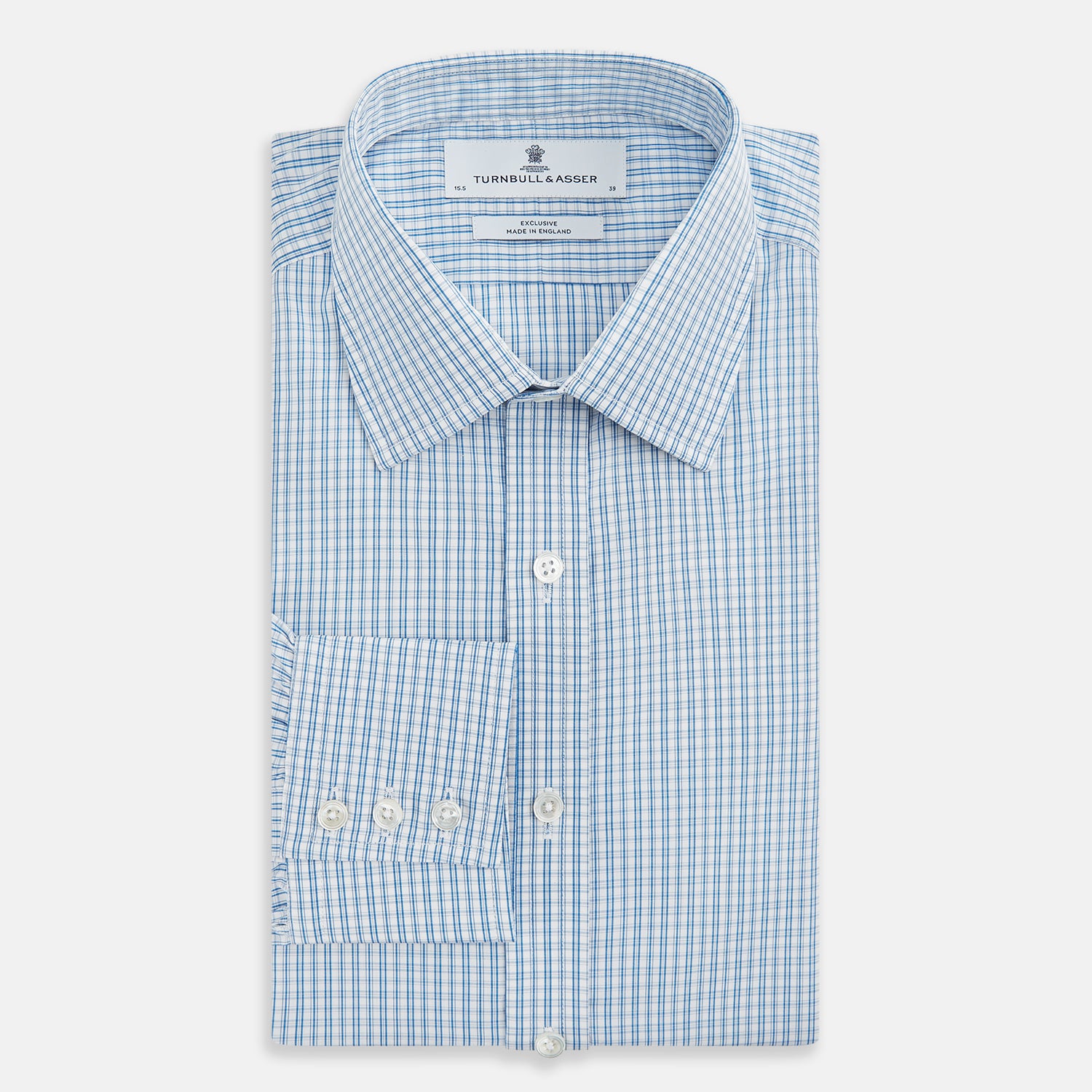 View 5 of product The Sky Blue Micro Graph Check Mayfair Shirt by Turnbull & Asser features a classic T&A collar, button-down front, and buttoned cuffs, shown laid flat on a white background.