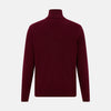 View 3 of product The Turnbull & Asser Ruby Red Half-Zip Cashmere Jumper, with a stand-up collar and elegant design, is displayed against a plain white background.
