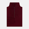View 4 of product The Turnbull & Asser Ruby Red Half-Zip Cashmere Jumper, with a stand-up collar and elegant design, is displayed against a plain white background.