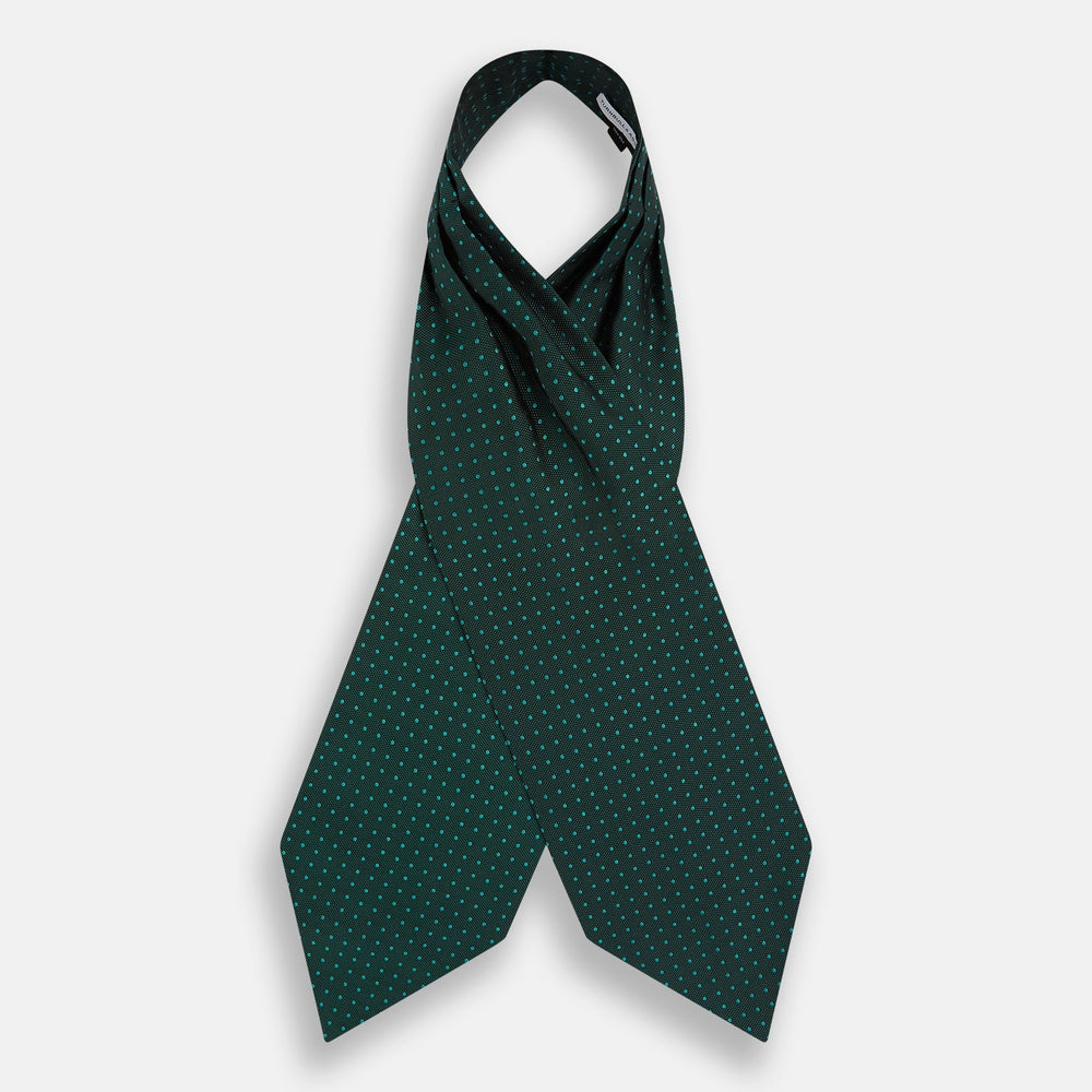 The Turnbull & Asser Blue and Forest Green Micro Dot Silk Cravat pairs perfectly with a dark green pocket square featuring light blue micro dots, ideal for formal looks or adding distinction to your ensemble.