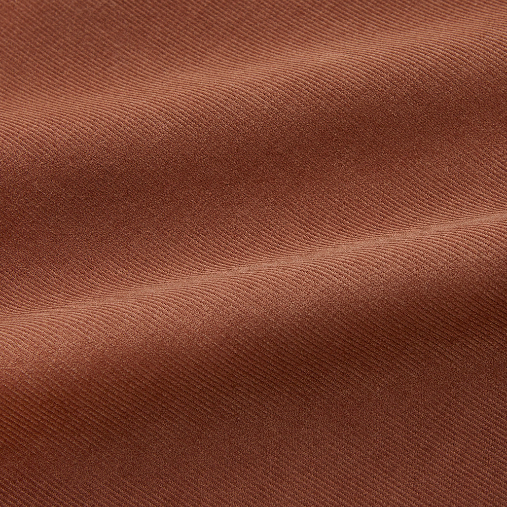 The Turnbull & Asser Rust Cotton Weekend Fit Blake Shirt features long sleeves, a stand collar, and white buttons—an ideal casual piece displayed flat on a white background.