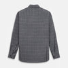 View 3 of product The Turnbull & Asser Charcoal Melange Check Hampstead overshirt, a long-sleeve button-up with a collar and two zippered side pockets, is laid flat on a light gray background.