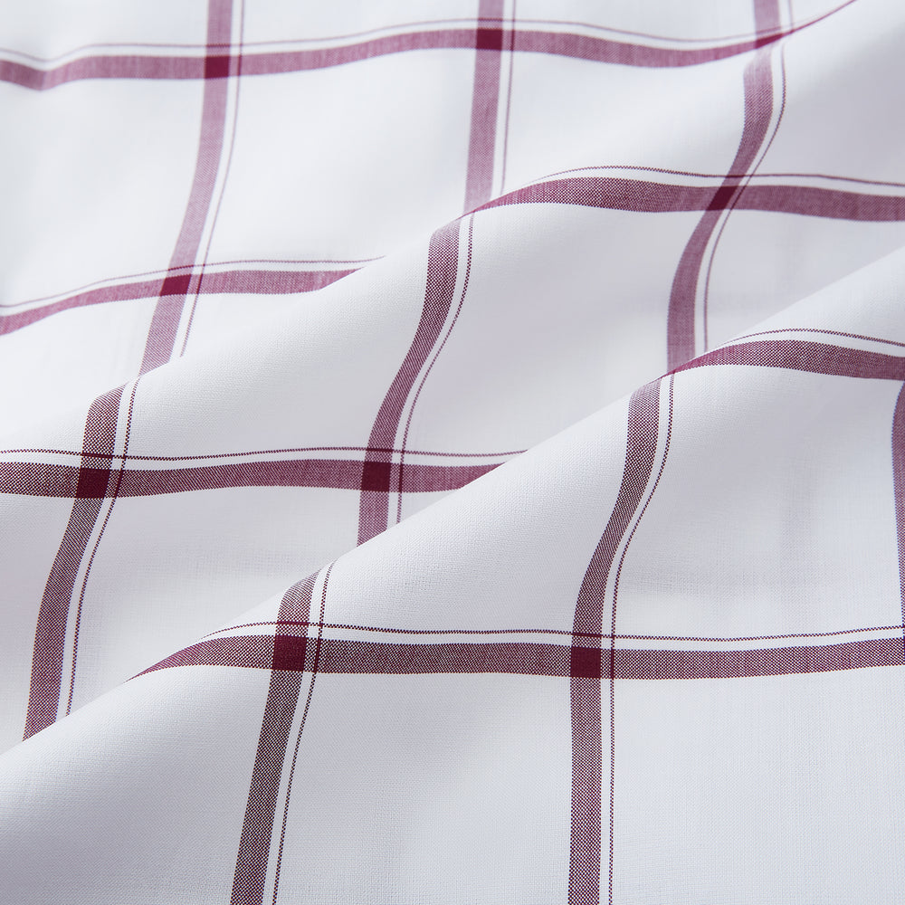 A long-sleeve, button-up Burgundy Grid Check Mayfair Shirt by Turnbull & Asser, made from Italian cotton with a spread collar and red grid check pattern, displayed flat on a plain white background.