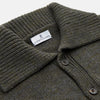 View 2 of product The Turnbull & Asser Green and Grey Cashmere Melange Lowry Cardigan is a long-sleeve piece with a revere collar, button-up front, and ribbed cuffs and hem, shown laid flat on a white background.
