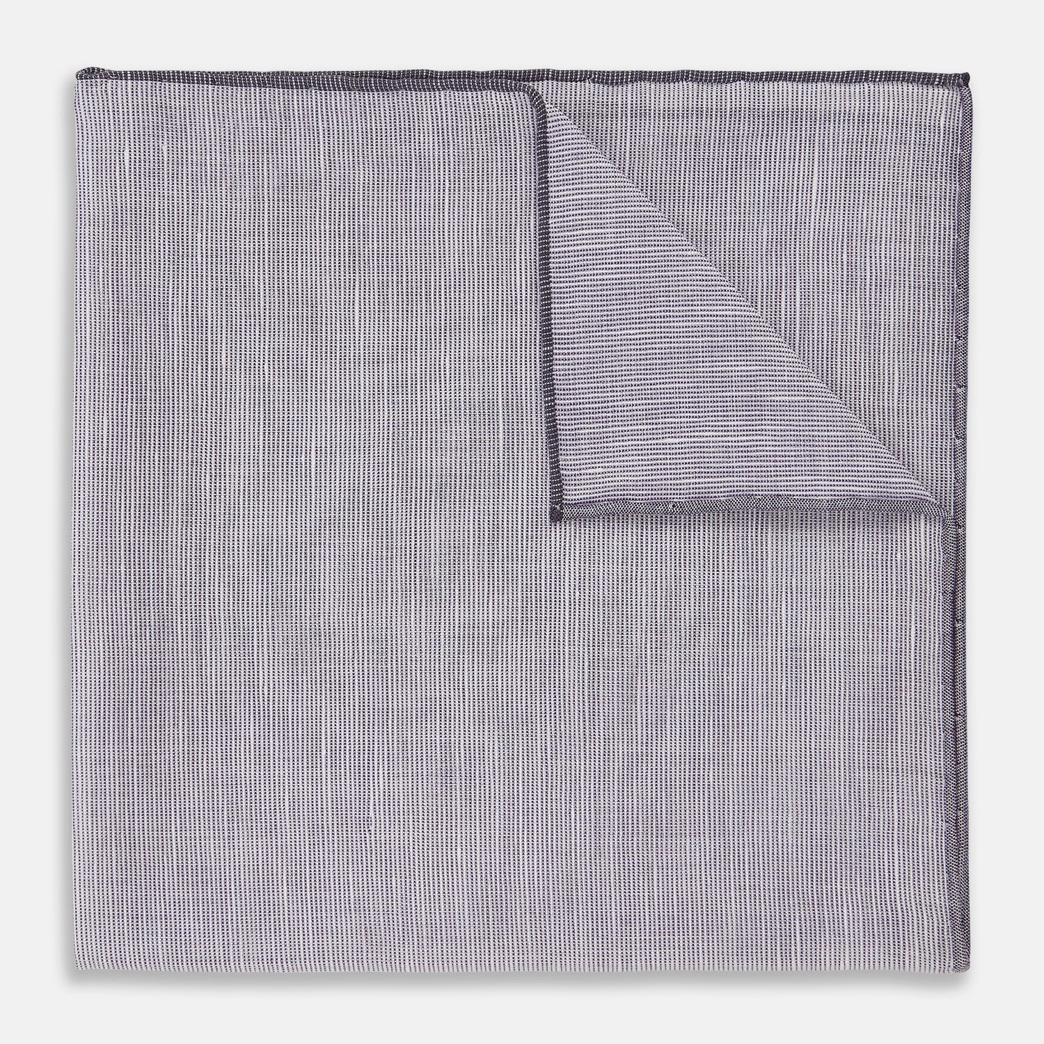 View 1 of product The Lilac Cotton-Blend Handkerchief by Turnbull & Asser is neatly folded with a corner flipped over, exposing the hand-rolled edges, and displayed against a white background.