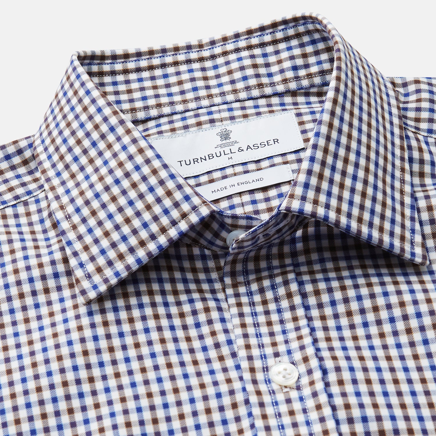 View 3 of product A must-have for any men's wardrobe, the Turnbull & Asser Brown and Blue Cotton Multi Check Weekend Fit Finch Shirt features long sleeves, button-down design, collar, and buttoned cuffs in a stylish check pattern.