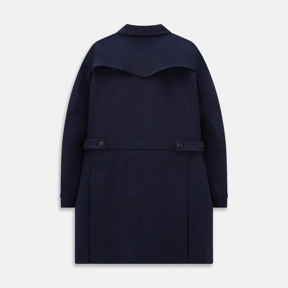 A Navy John Arthur Trench Coat by Turnbull & Asser, featuring a collar, button closure, adjustable cuff straps, two slanted front pockets, and a chest zip pocket, is displayed flat on a white background.