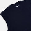 View 2 of product The Turnbull & Asser Navy Fine Merino V-Neck Vest is a sleeveless sweater exuding sophistication with its classic design, shown on a plain white background.