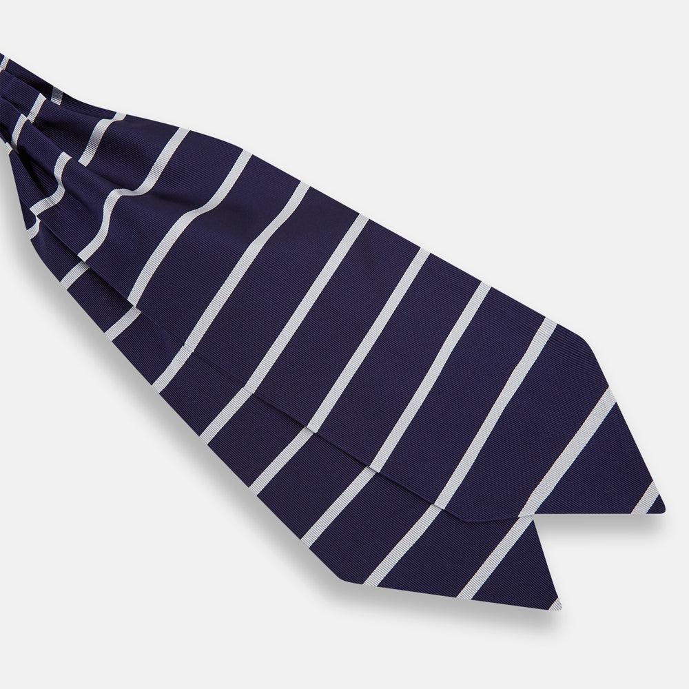 The Turnbull & Asser Silver Stripe and Navy Silk Cravat features two horizontal white stripes on navy silk, offering a sophisticated British-inspired design—ideal as a unique wedding accessory.