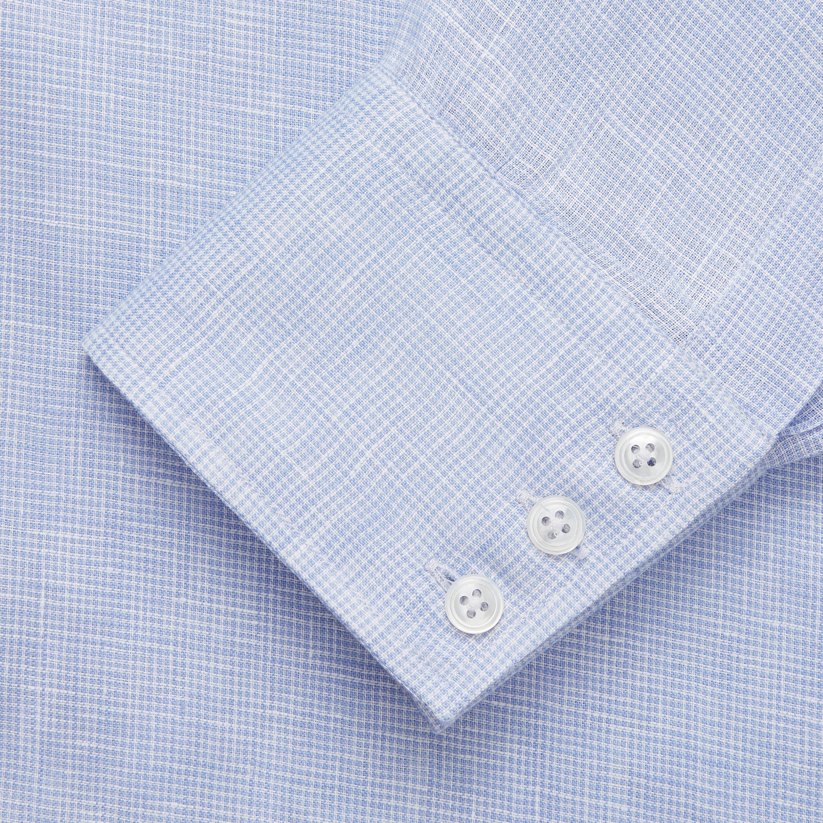 View 4 of product Turnbull & Asser's Pale Blue Check Linen Regular Fit Mayfair Shirt features a classic collar, front pocket, and buttoned cuffs—a breezy update to the traditional check shirt.