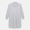 View 1 of product The Turnbull & Asser Purple Multi Stripe Quarzo Nightshirt features a collared, button-front design with a chest pocket and vertical white and light gray stripes, shown laid flat on a white background.