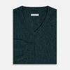 View 4 of product The Turnbull & Asser Forest Green Cashmere V-Neck Jumper features long sleeves, ribbed cuffs, collar, and hem. Shown against a white background, it's a classic knitwear piece ideal for layering.