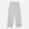 View 5 of product The Turnbull & Asser Blue Multi Check Cotton-Cashmere Modern Pyjama Set features a two-piece design with a long-sleeve button-up top with breast pocket and matching elastic-waist pants in a blue and white check pattern.