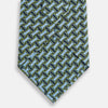 View 3 of product The Turnbull & Asser Light Blue and Chartreuse Lemon Weave Patterned Silk Tie, crafted from fine English silk, features a geometric design in blue and green tones, displayed on a plain white background.