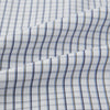 View 6 of product The Turnbull & Asser Blue and Coffee Tattersall Check Mayfair Shirt is a long-sleeved, button-up style made from Italian cotton, featuring a collar and buttoned cuffs, shown laid flat against a white background.