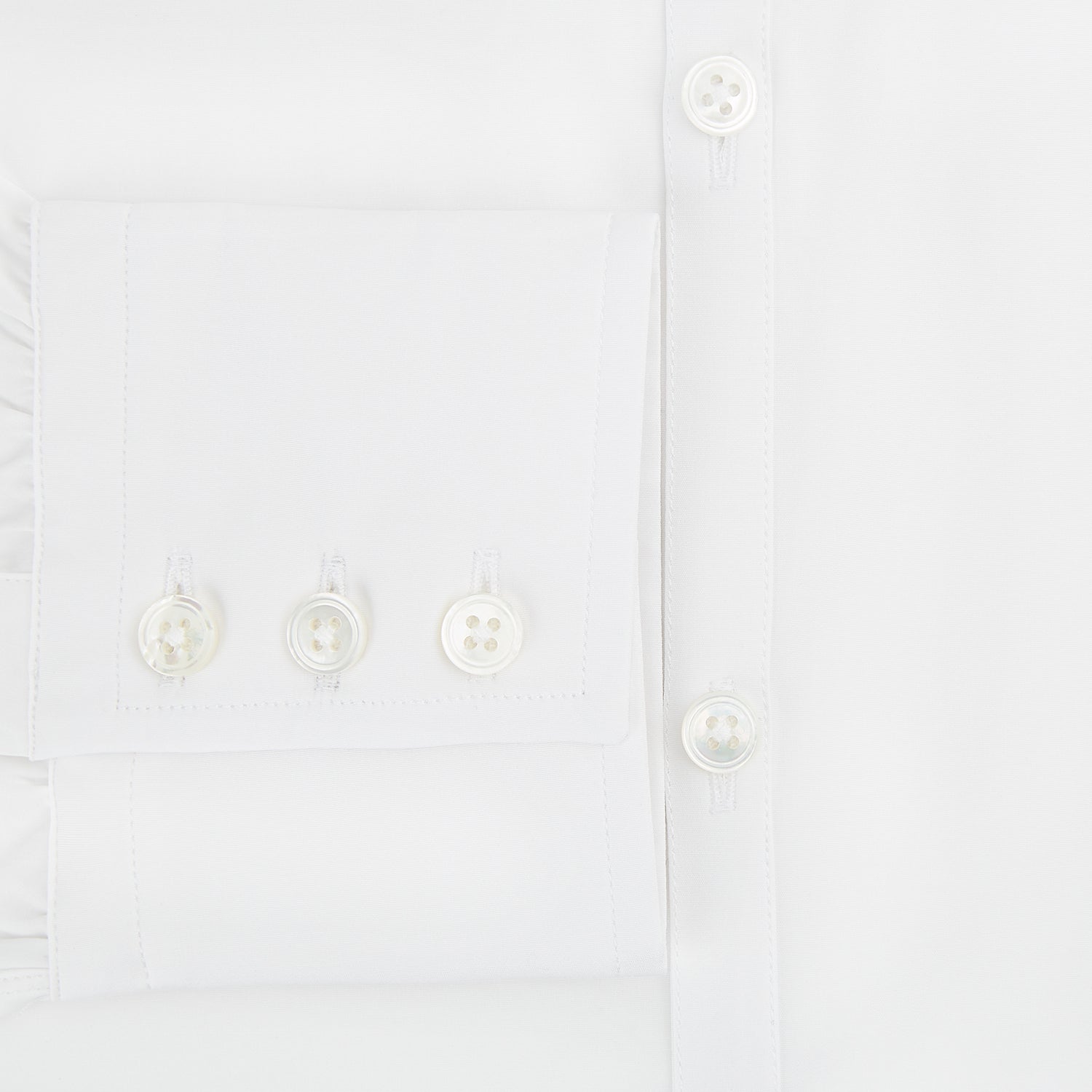 View 4 of product The Turnbull & Asser White Westminster Shirt is a long-sleeve, button-up dress shirt with a classic cut and Westminster collar, shown on a white background.