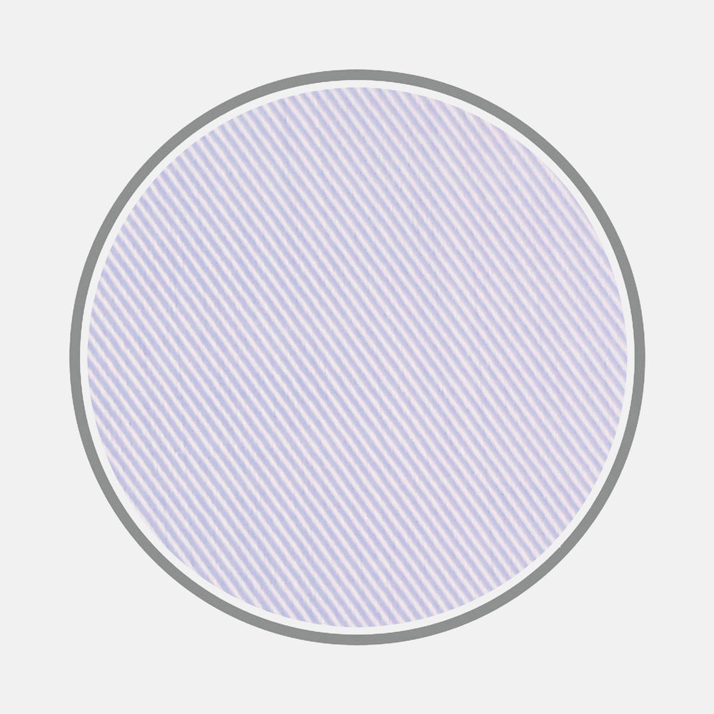 A large circle with a thin gray outline features diagonal, closely spaced, light blue twill lines on white, representing Turnbull & Asser’s Blue Twill Sea Island Quality Cotton Fabric, centered on a plain light gray background.