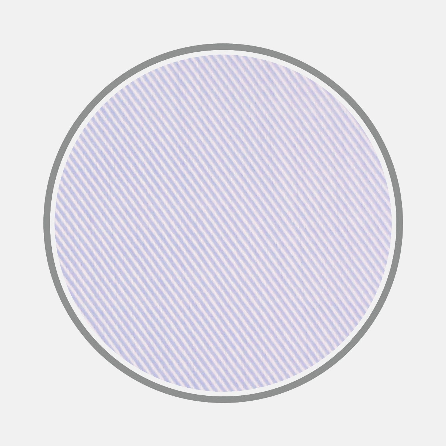 View 1 of product A large circle with a thin gray outline features diagonal, closely spaced, light blue twill lines on white, representing Turnbull & Asser’s Blue Twill Sea Island Quality Cotton Fabric, centered on a plain light gray background.