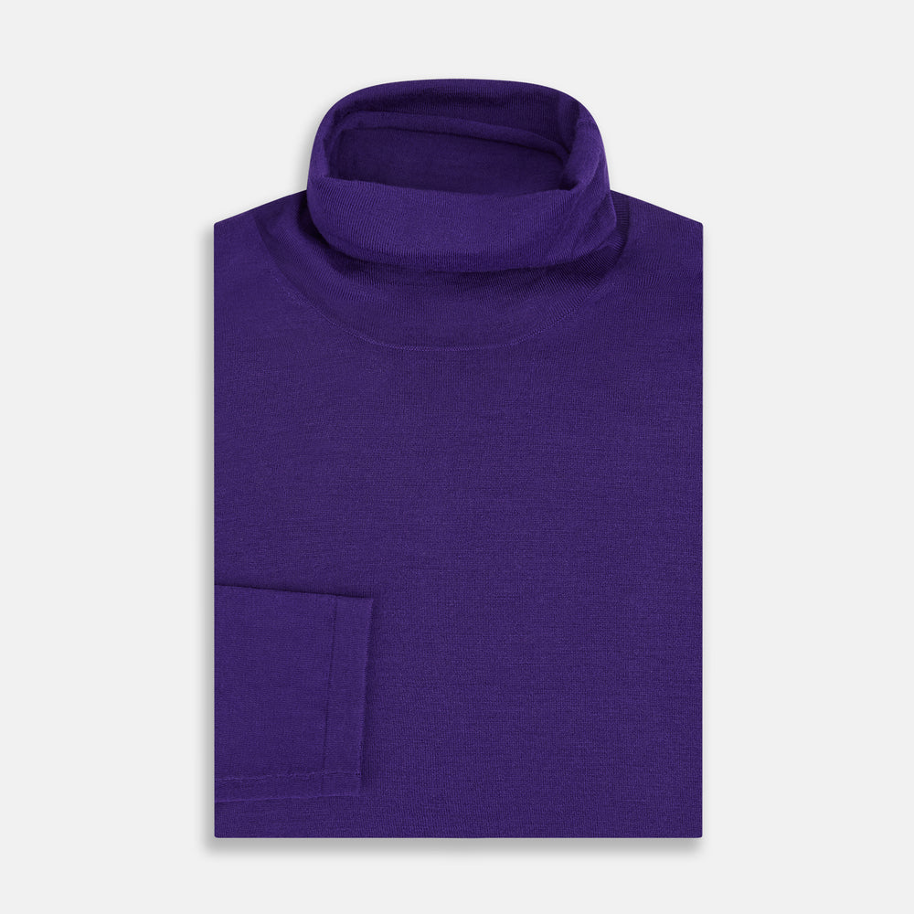The Turnbull & Asser Purple Fine Merino High Neck Jumper is shown on a white background, featuring a plain, long-sleeved design that highlights the classic elegance of Italian knitwear.