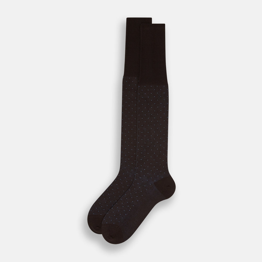 The Turnbull & Asser Dark Chocolate/Pale Blue Polka Dot Long Sock is shown as a single over-the-calf sock with pale blue dots on dark brown, displayed against a plain white background.