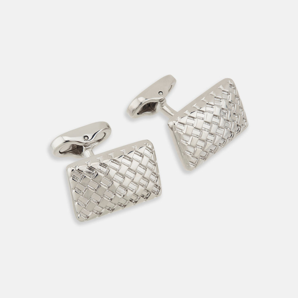 Turnbull & Asser Silver Basketweave Rectangular Cufflinks feature a striking basketweave design on the front and are showcased on a white background.