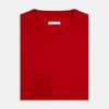 View 4 of product The Turnbull & Asser Red Merino Round Neck Jumper features long sleeves, ribbed cuffs and hem—a classic men's knitwear essential shown on a white background.