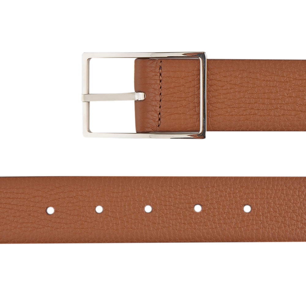 The Turnbull & Asser Lagun grained Nubuk Reversible Leather Belt features a tan finish, silver rectangular buckle, and purple inner lining, shown coiled on a white background.