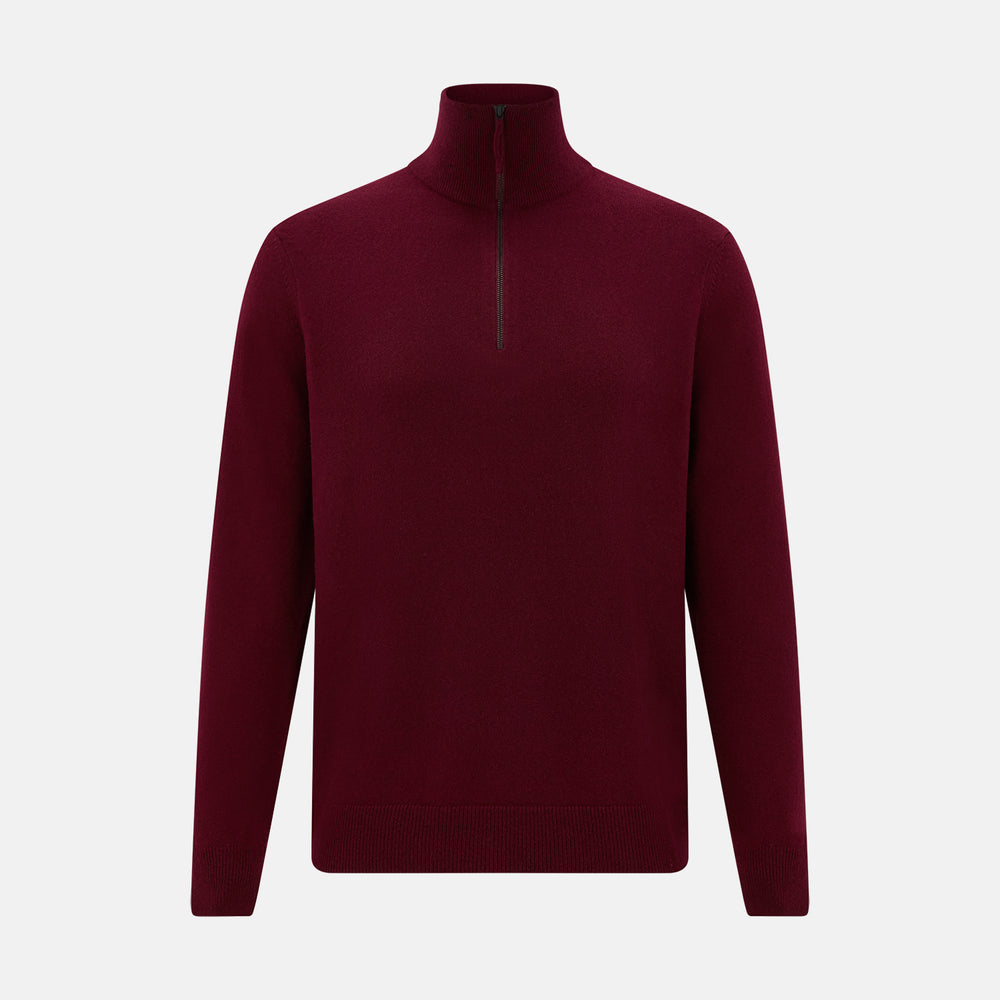 The Turnbull & Asser Ruby Red Half-Zip Cashmere Jumper, with a stand-up collar and elegant design, is displayed against a plain white background.