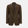 View 1 of product The Turnbull & Asser Brown Gingham Check Sports Jacket features a single button closure, notched lapels, and two front flap pockets, shown against a plain white background.