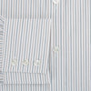 View 4 of product The Teal Double Stripe Mayfair Shirt by Turnbull & Asser is a long-sleeved, button-up shirt with thin teal stripes, a pointed collar, and buttoned cuffs—an essential piece for any gentleman’s wardrobe, shown laid flat on a white background.