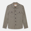 View 1 of product The Turnbull & Asser Black Gingham Check Wool Blend Somerset Overshirt features long sleeves, two chest flap pockets with buttons, and a black-and-beige check pattern. Shown laid flat on a white background; ideal as transitional outerwear.