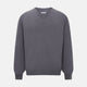 The Grey V-Neck Cashmere Jumper by Turnbull & Asser features long sleeves, ribbed cuffs and hem, in dark gray cashmere, shown against a white background.