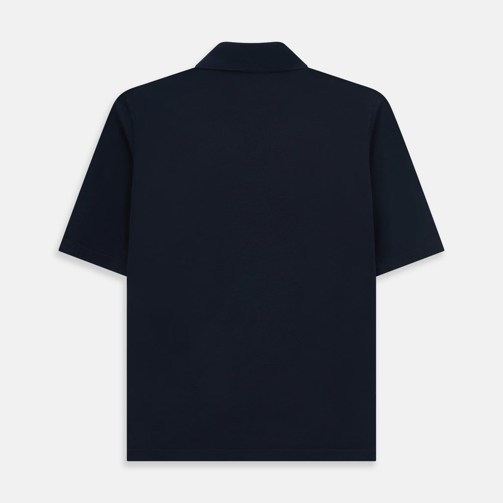The Turnbull & Asser Navy Polo Shirt features short sleeves, a collar, three-button placket, and a single buttoned chest pocket, shown flat on a plain white background.