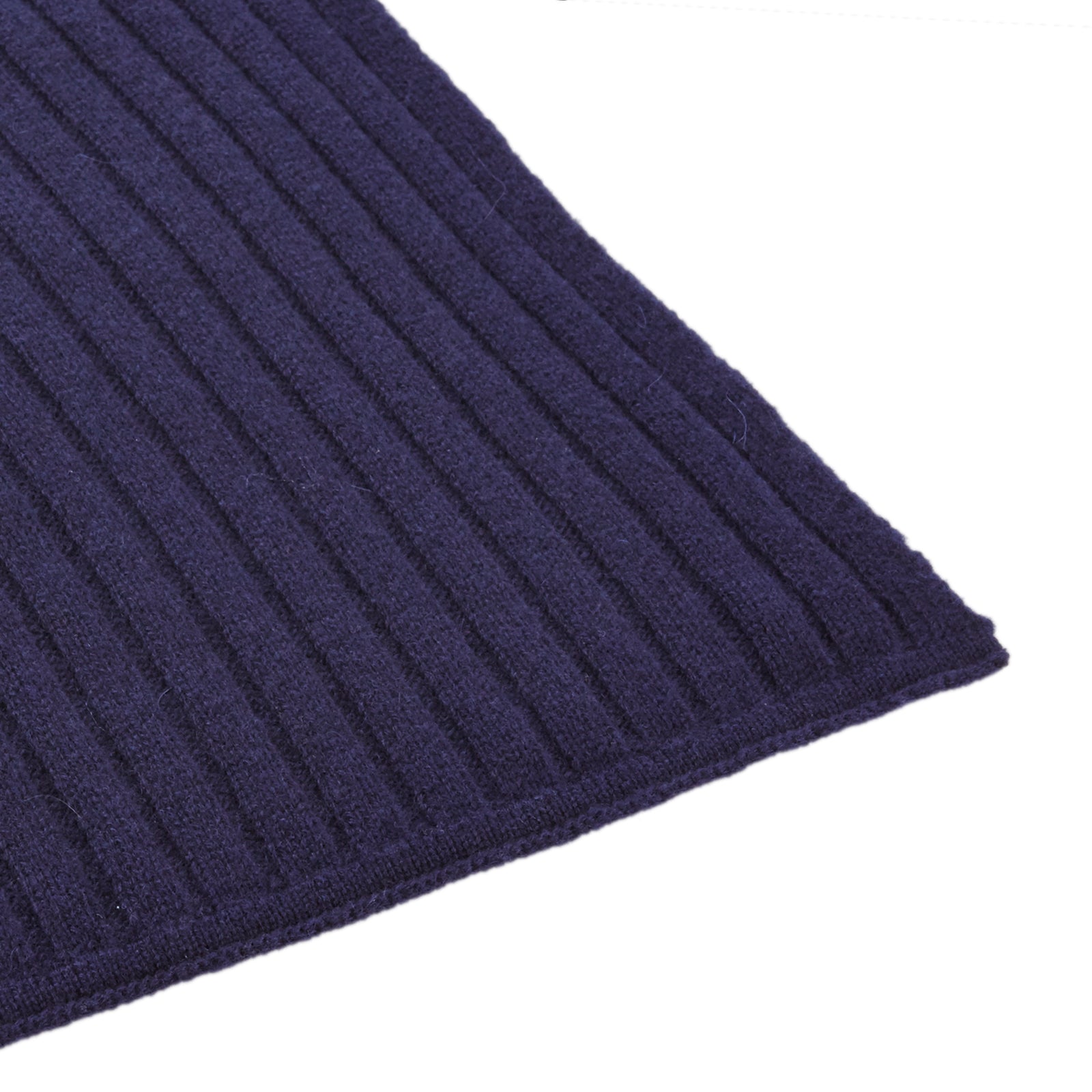 View 2 of product The Turnbull & Asser Navy Wide Rib Cashmere/Wool Scarf is neatly folded with both ends hanging down, set against a plain white background.
