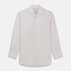 View 1 of product The Turnbull & Asser Red Multi Stripe Tailored Fit Shelton Shirt features subtle vertical stripes, a classic Kent collar, and buttoned cuffs, shown laid flat on a white background.